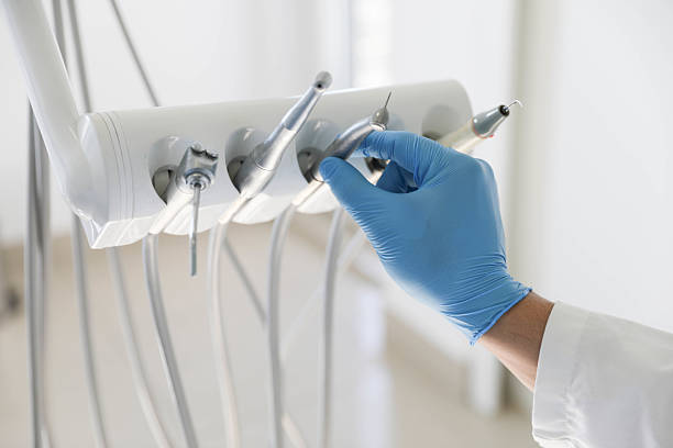 Professional Invisalign Clear Aligners technician working in Dorr, MI